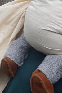 a sling with a baby in it howing how comfortable to wrap
